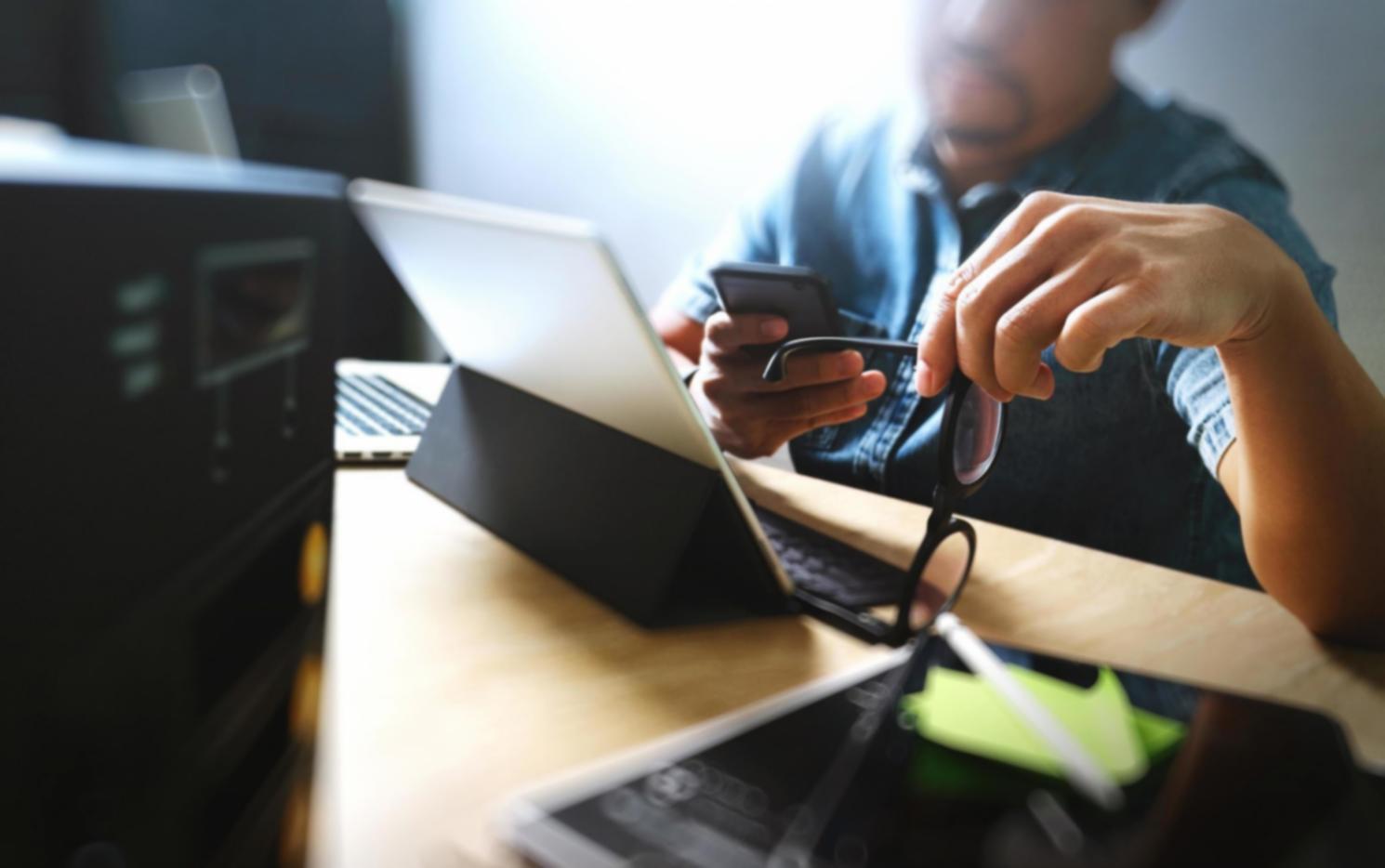 Close-up view of game development prototyping session with mobile devices