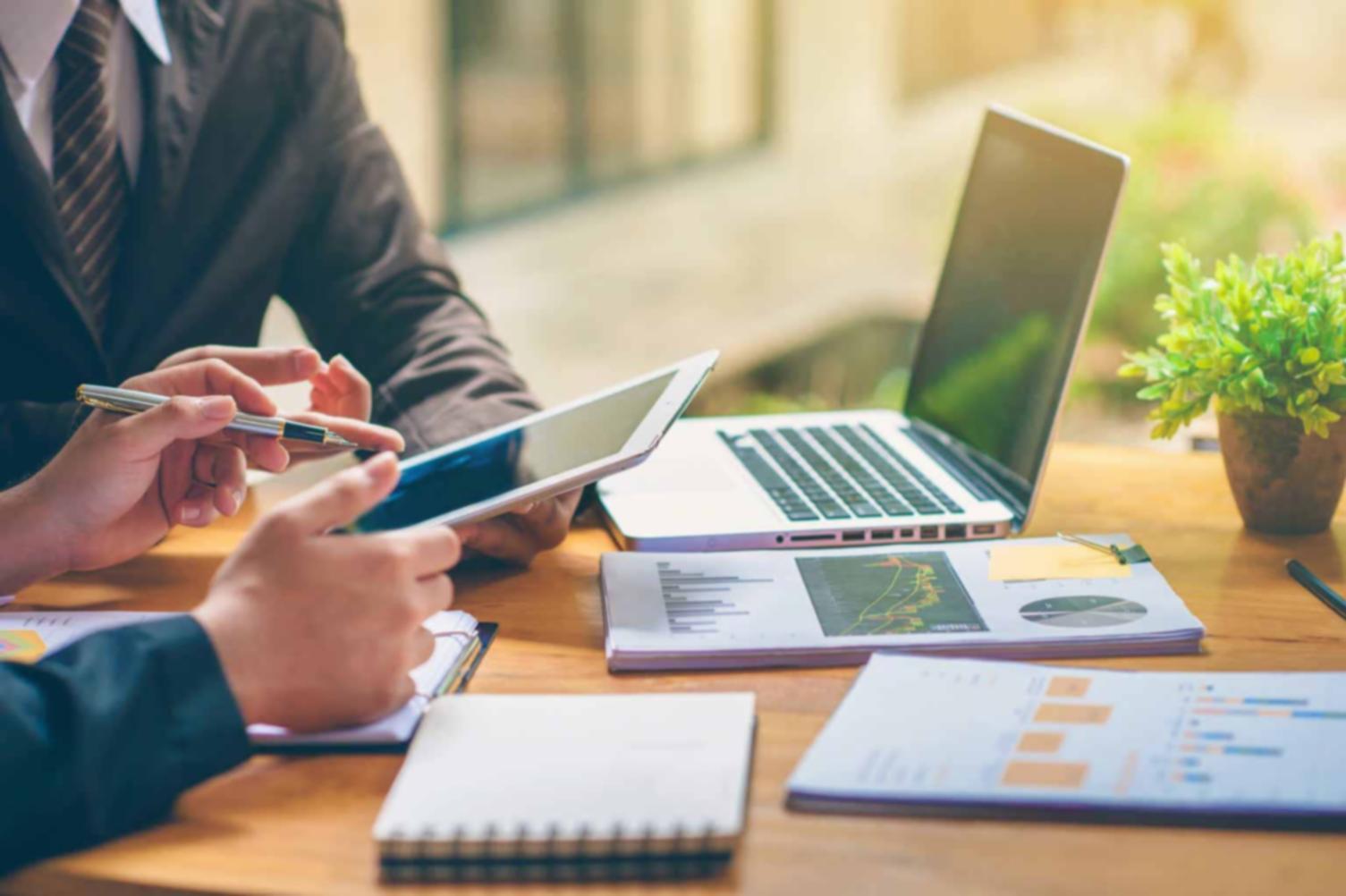 Multiple mobile devices displaying game prototypes across different genres including action, RPG, and racing games